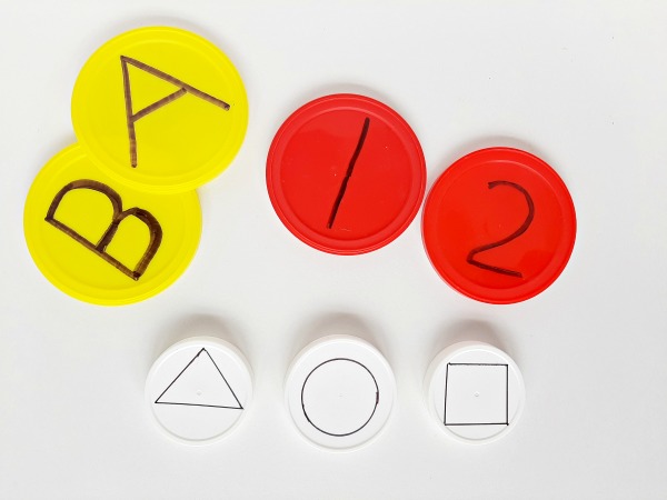 Label jar lids with letters numbers or shapes