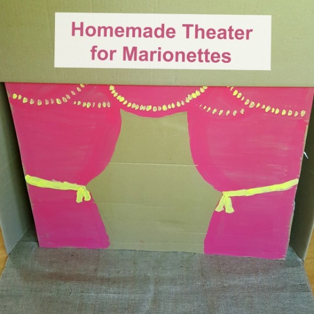 Cardboard box theater you can make for puppet shows with marionettes