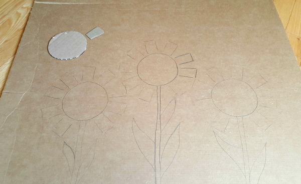 Sketch flowers on a cardboard screen for a backdrop