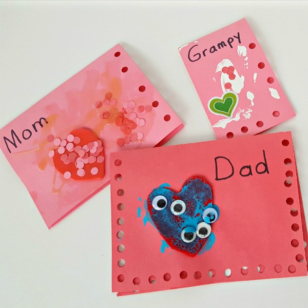 Valentine process art activity for kids using hole punch and glue
