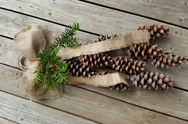 Homemade rustic decor with pine cones