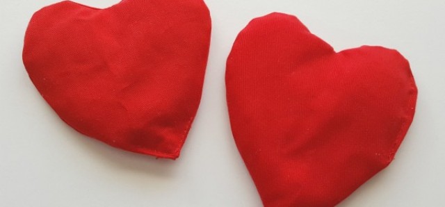 Make heart shaped bean bags for kids games and activities and add them to a Valentine theme - Preschool Toolkit