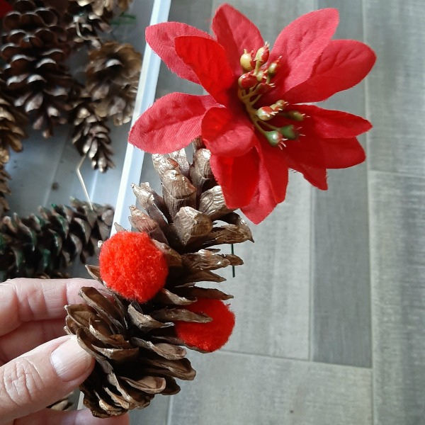 Pine cone craft and sensory bin for kids