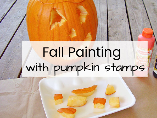 kids painting activity with pumpkin stamps