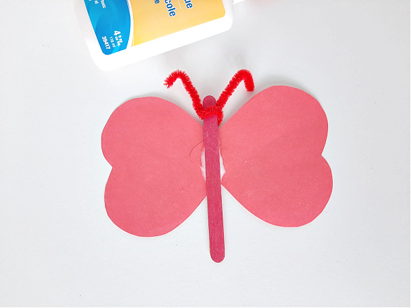 Preschool butterfly craft with heart shape wings