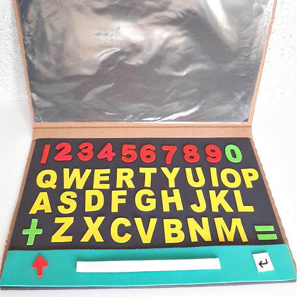 Literacy activity for toddler and preschooler on a cardboard laptop
