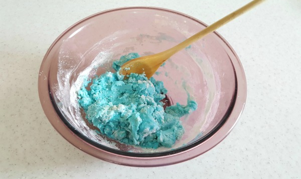 Mix salt and flour together to make uncooked play dough