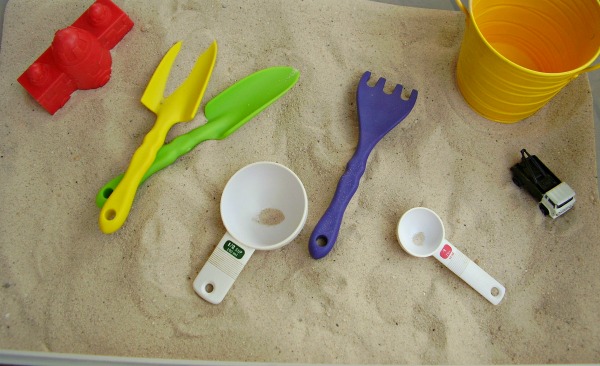 Sand play outside with toddlers and preschoolers