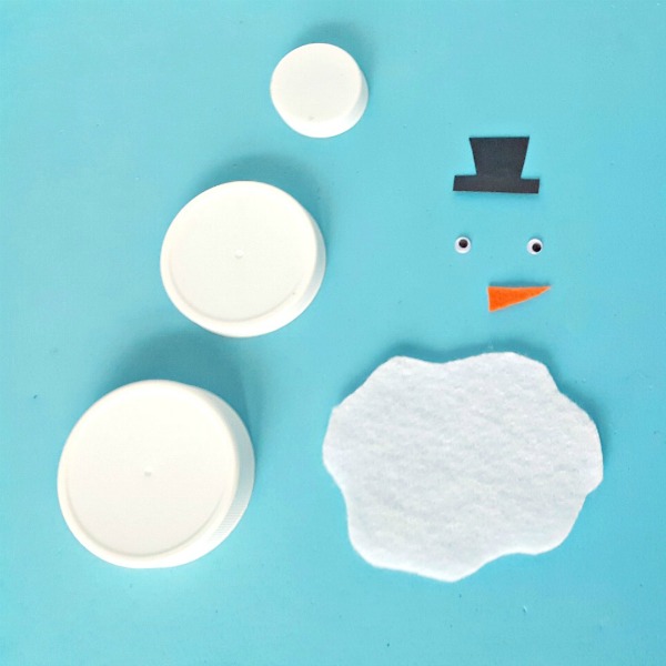 Supplies for a melting snowman craft