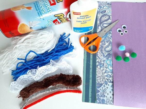 Recycled containers and basic craft supplies provide a members of the family craft for kids