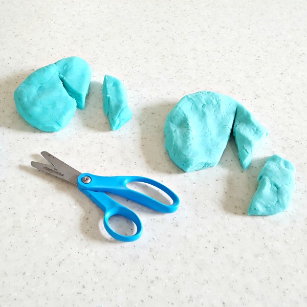 Support fine motor scissor skills with play dough activities