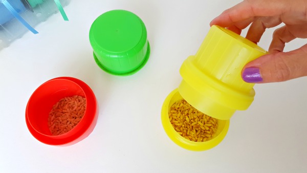 Add rice to laundry bottle tops to make music shakers