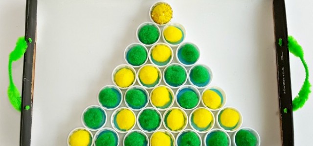 Christmas STEAM preschool activity with bottle caps and pompoms