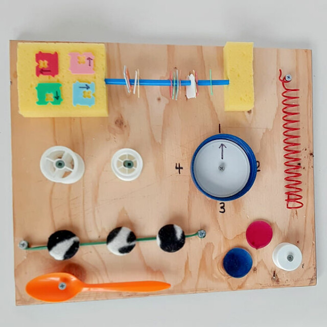 Easy homemade busy board for preschool fine motor play