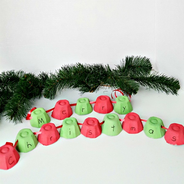 Holiday garland made with recycled egg cups fun craft for preschoolers