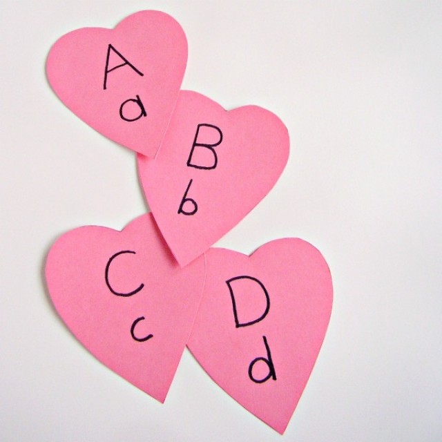 Letters of the alphabet heart shape cards for a Valentine literacy activity
