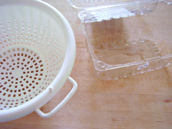 Recycle a produce container for rinsing fruit and veggies