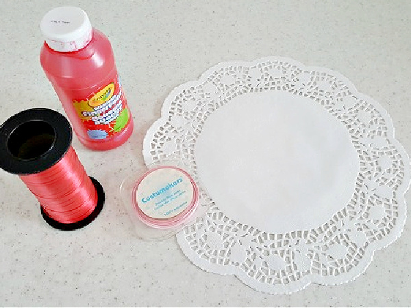 Handprint painting doily craft