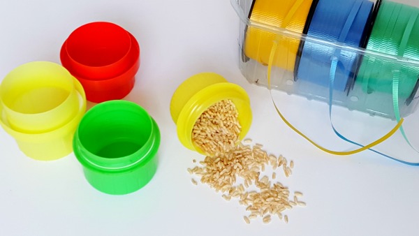 Make music shakers with rice and bottle tops