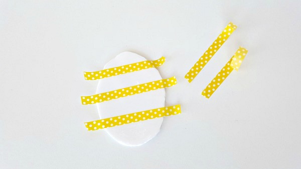 Craft tape on foam eggs activity for kids