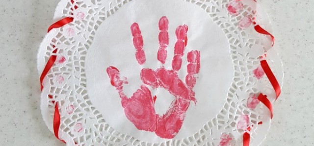 Handprint doily painting activity for preschoolers - Preschool Toolkit