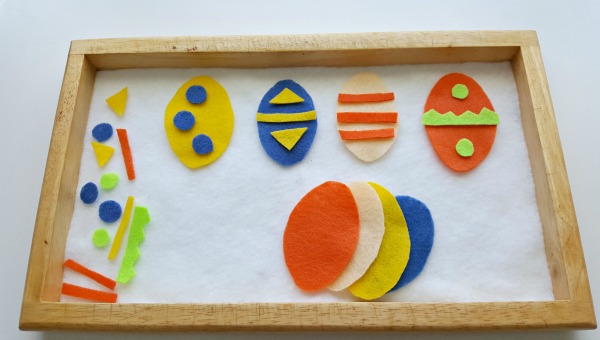 Provide felt eggs and shape cutouts for a sorting activity