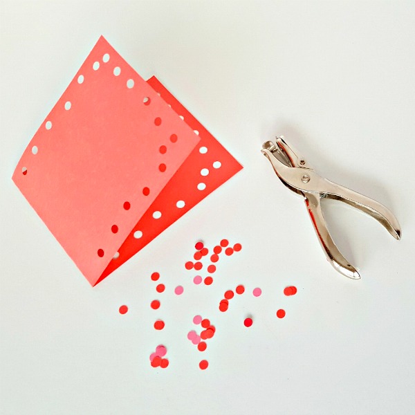 fine motor card making activity with a hole punch