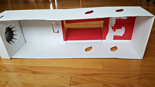 Inside view of the box used to make the puppet theater