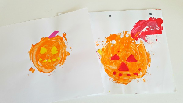 Pumpkin paintings kids can make with craft stick painting tools