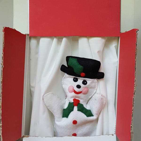 puppet theater with snowman puppet for story time