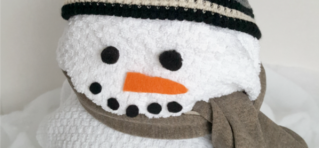 This snowman activity is a fun and unique way to wrap presents for a 'greener' Christmas - Preschool Toolkit