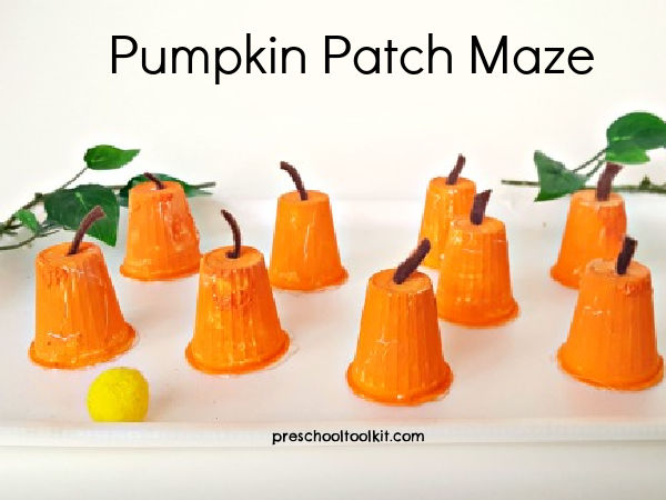 fall craft pumpkin maze with recyclables 
