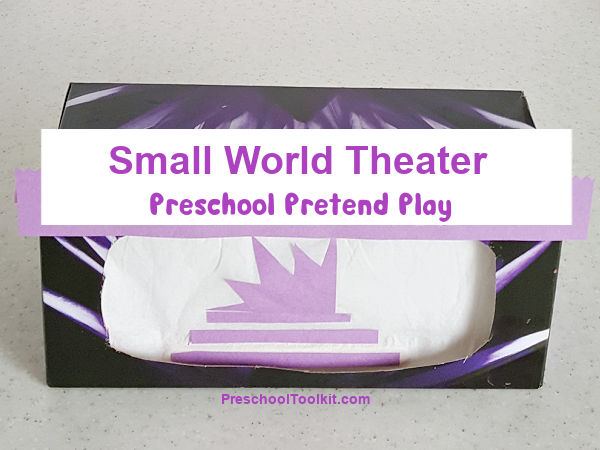 pretend play with a cardboard box theater