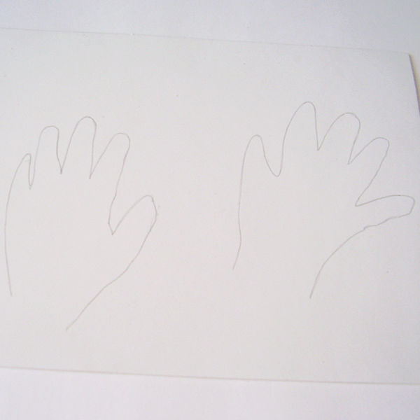 trace around child's hands on sheet of craft foam