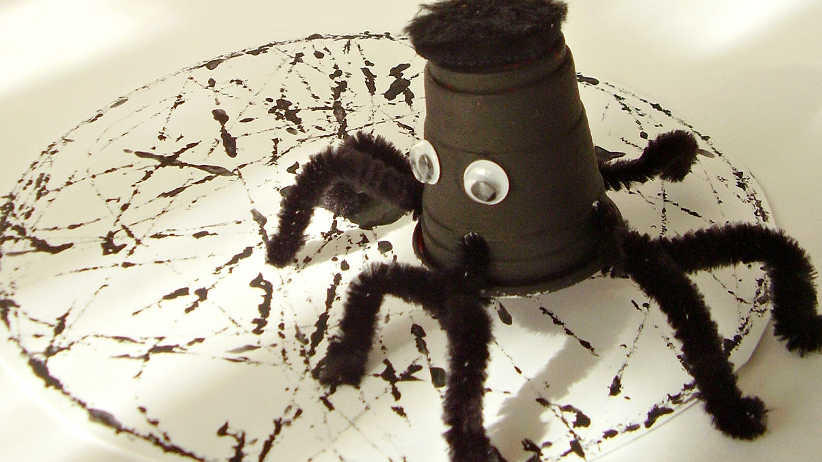 spider craft made with small recycled cups for Halloween theme
