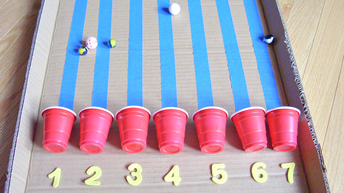 roll marbles down a cardboard inclined plane preschool science activity