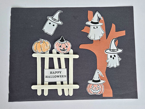 Halloween art with craft sticks and paper cutouts