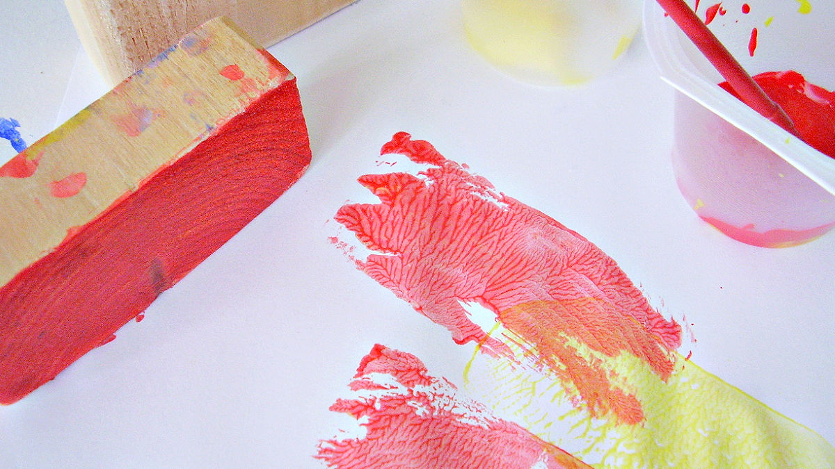 kids painting activity with wood blocks paint stamps