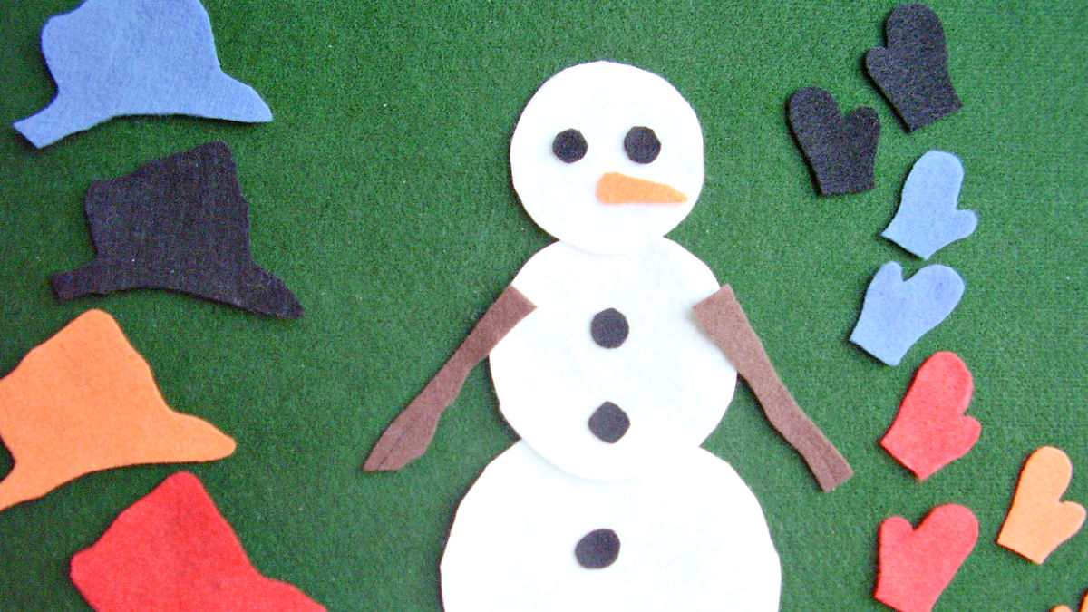 Matching game with felt hat and mittens for a snowman on the flannel board