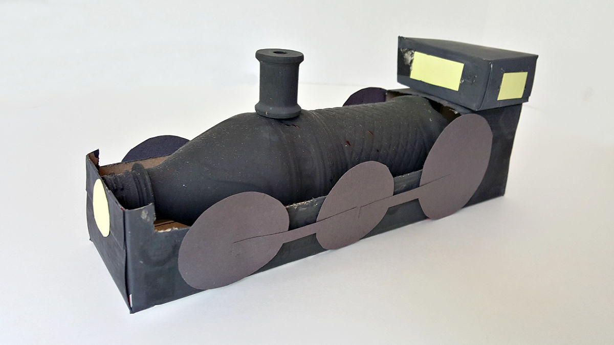 make a locomotive craft with recyclables for small world train activities