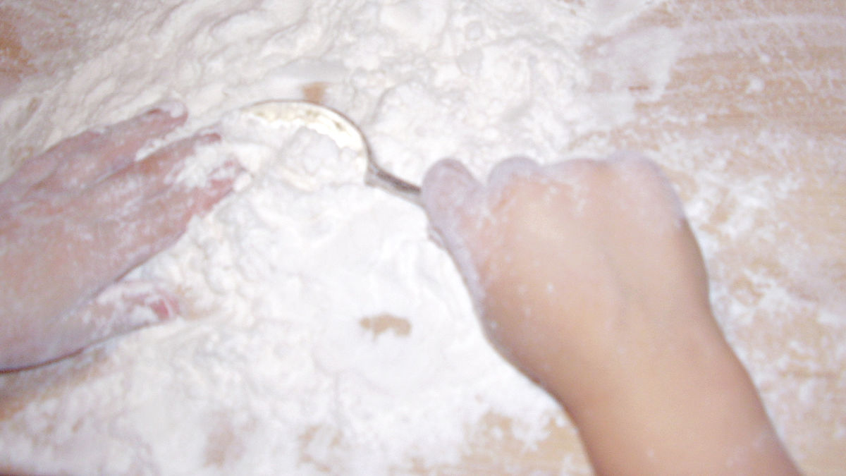 preschool activity in the kitchen with four and spoons