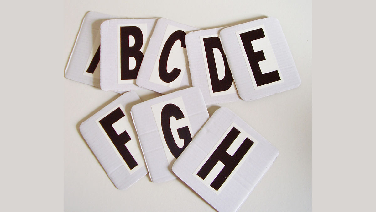 play literacy games with homemade set of alphabet cards