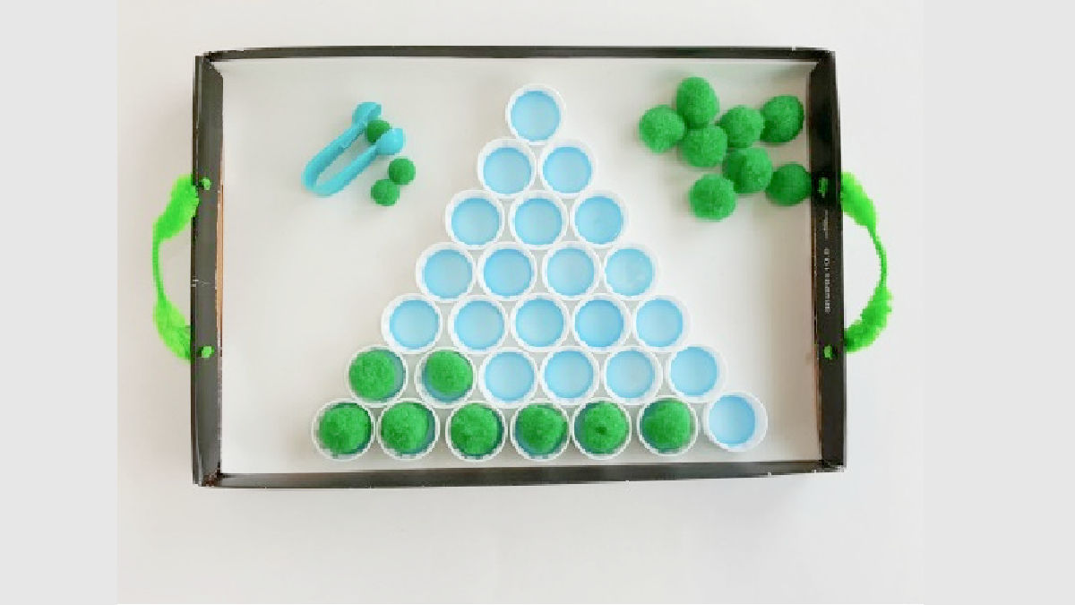 kids science play idea with pompoms and bottle caps