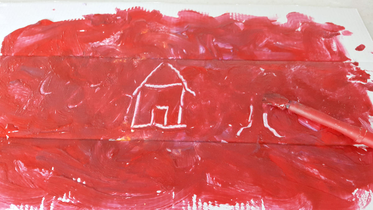 kids can draw on a painted canvas in a creative art activity