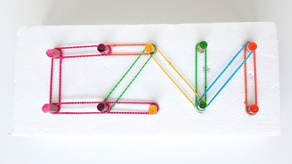 make a simple geoboard with recycled crayons