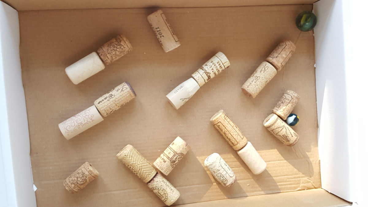 kids science cardboard box maze wit recycled corks