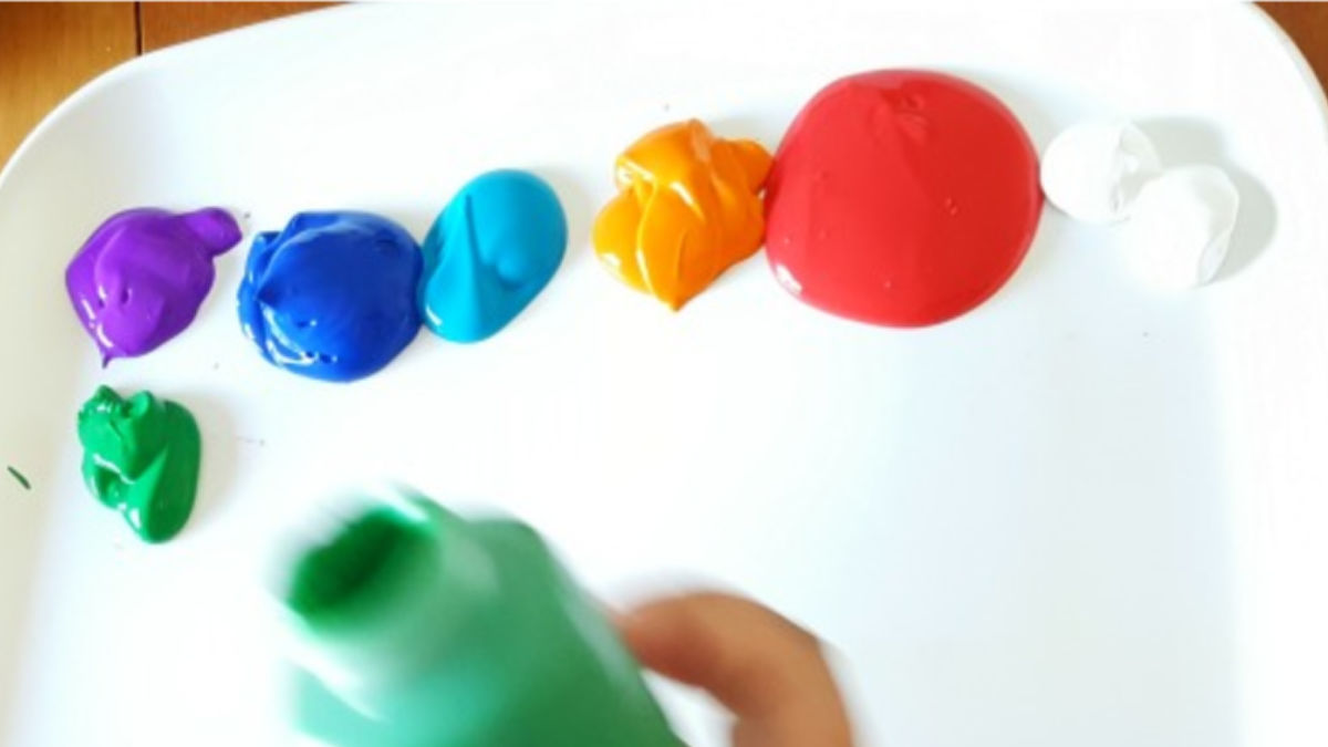 preschool science mixing colors in a painting activity