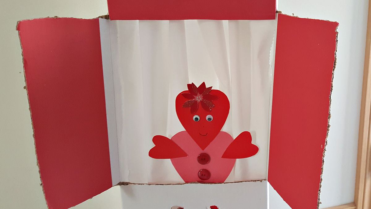 DIY project cardboard box puppet theater for kids