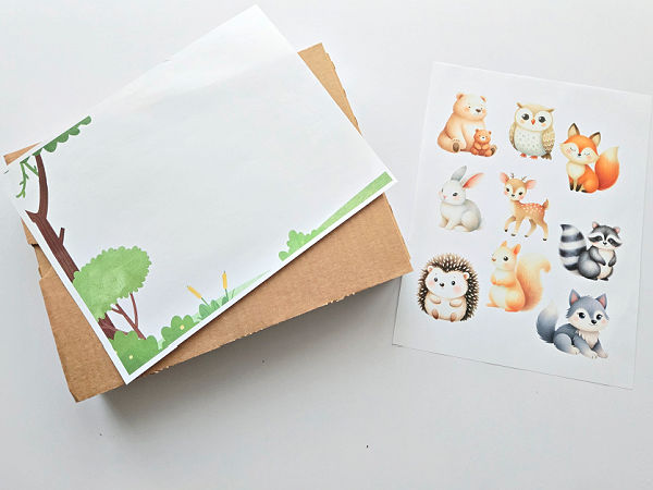 Printable page with nine woodland animals and one printable page with a forest scene