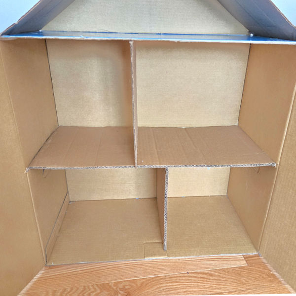 completed doll house with roof and rooms and doors
